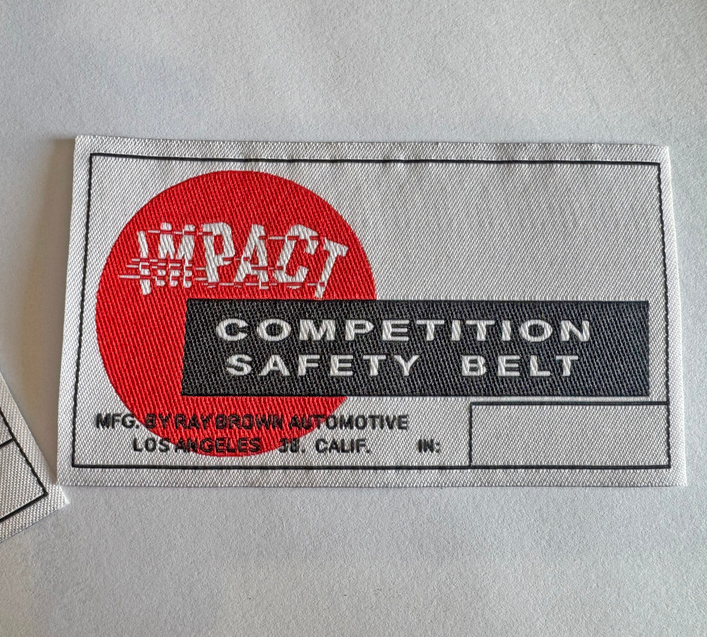 Étiquettes de ceinture de sécurité Ray Brown Impact